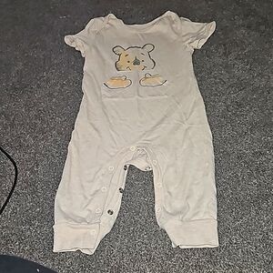 12 month romper with short sleeves and pants. Winnie the Pooh on it.